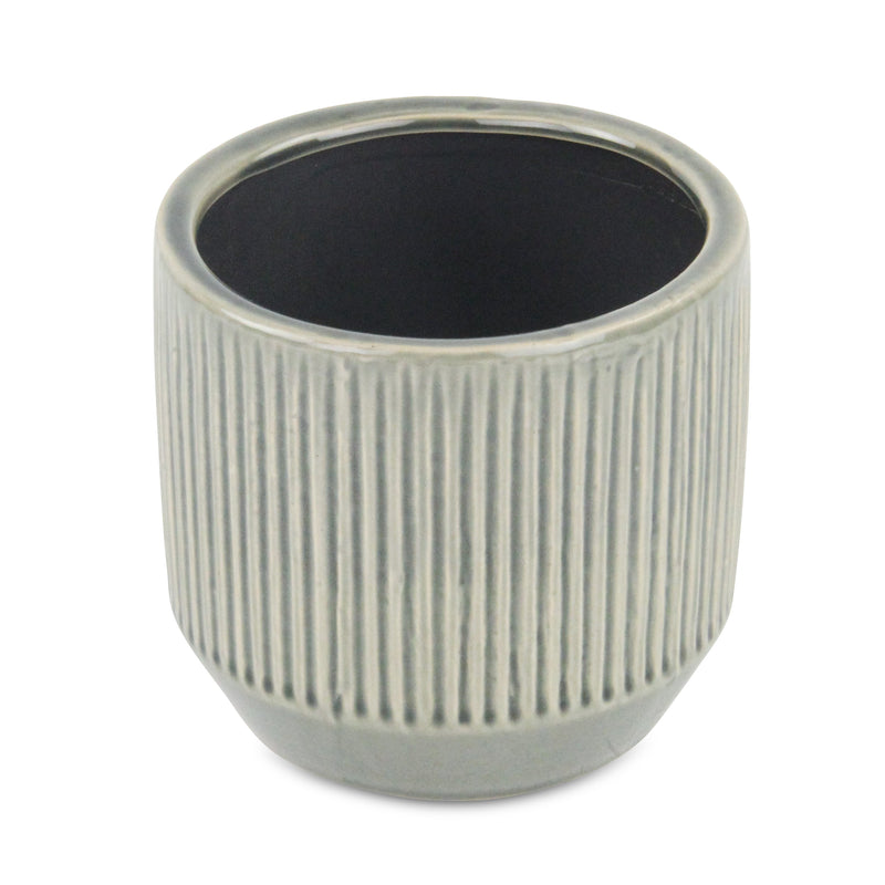 5778<p>Tolo  Ruffled Ridge Pot</p>